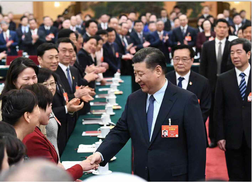 习近平参加河南代表团审议，向全国各族各界妇女致以节日的祝贺